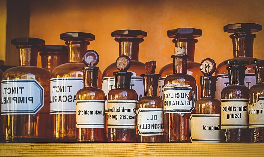 pharmacy old bottles drug medicinal products cure chemistry brown historically